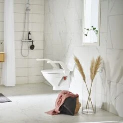 ETAC My-Loo Rise Seat W/ Arms ETAC My-Loo Raised Toilet Seat W/ Arms - 2cm